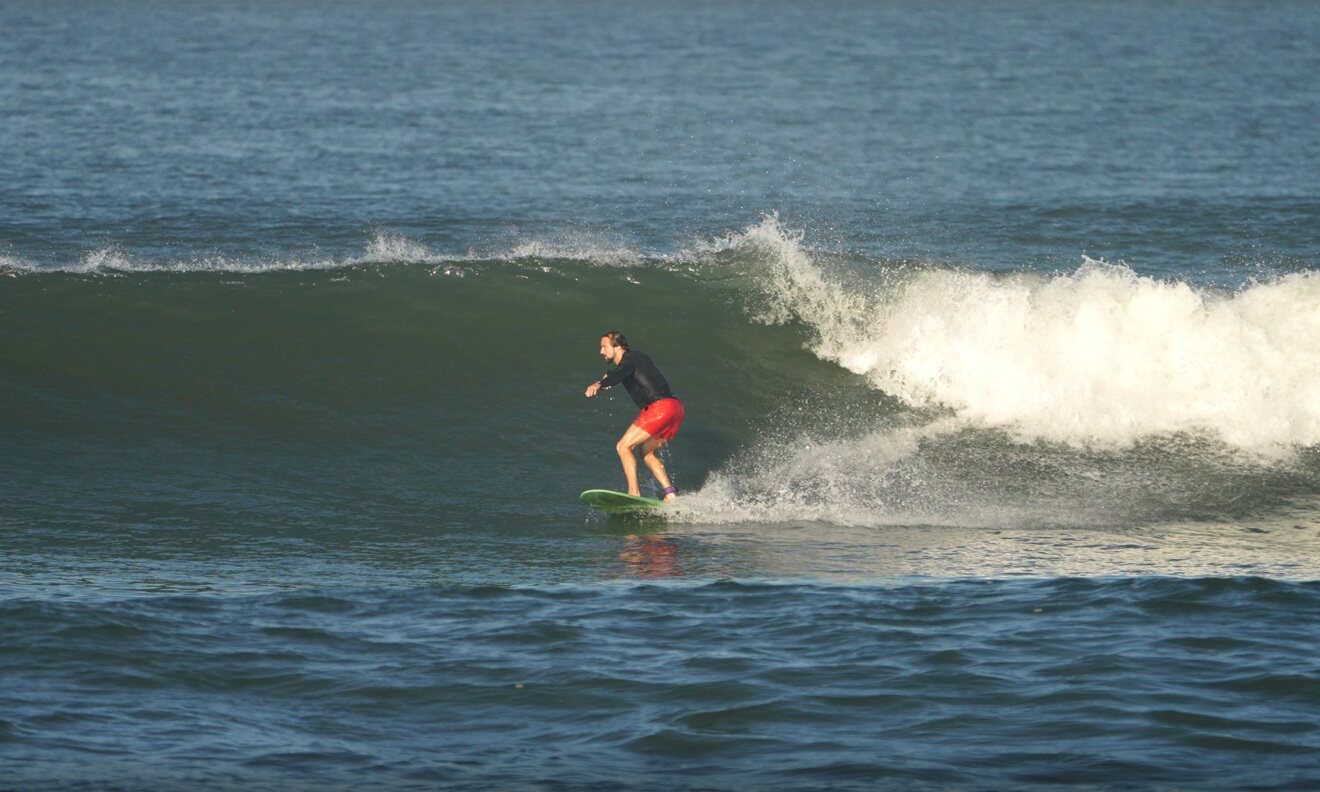 Riding a wave in Bali